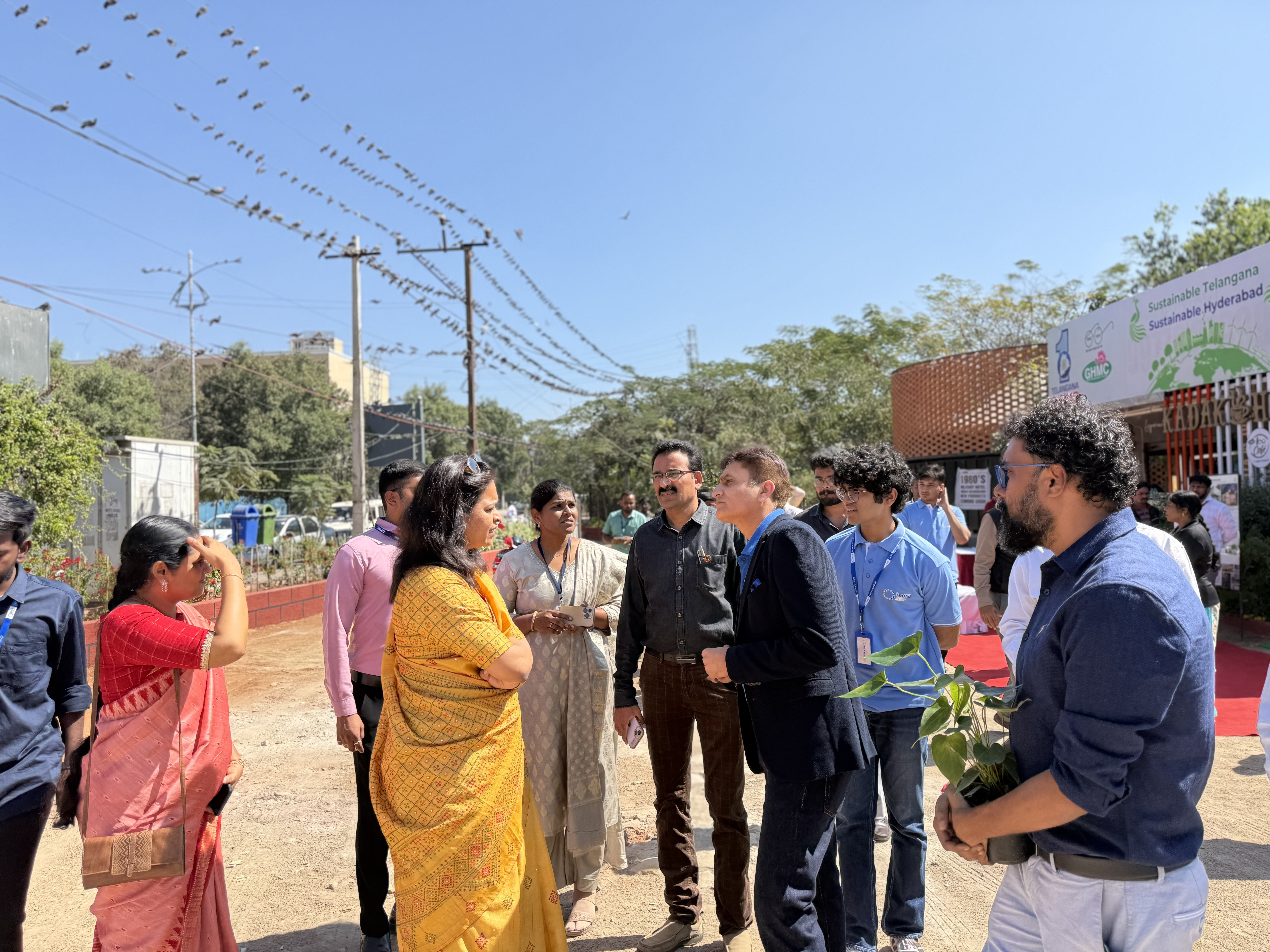 Officials touring the LooCafe facility