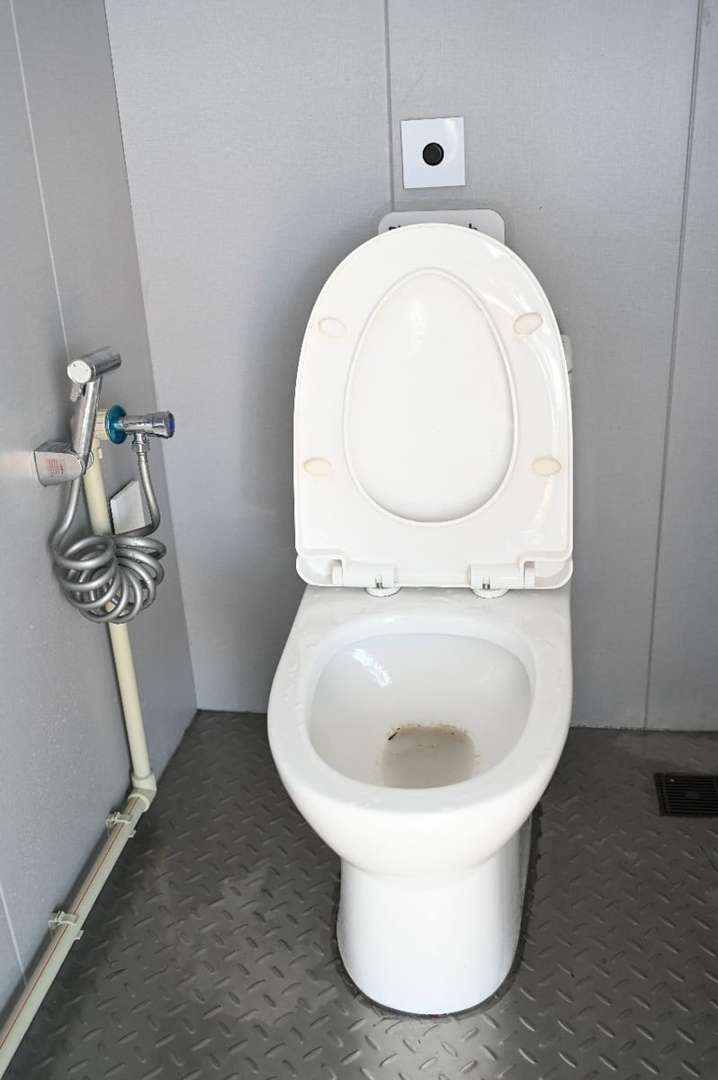 B-CRT interior toilet cubicle with modern fixtures